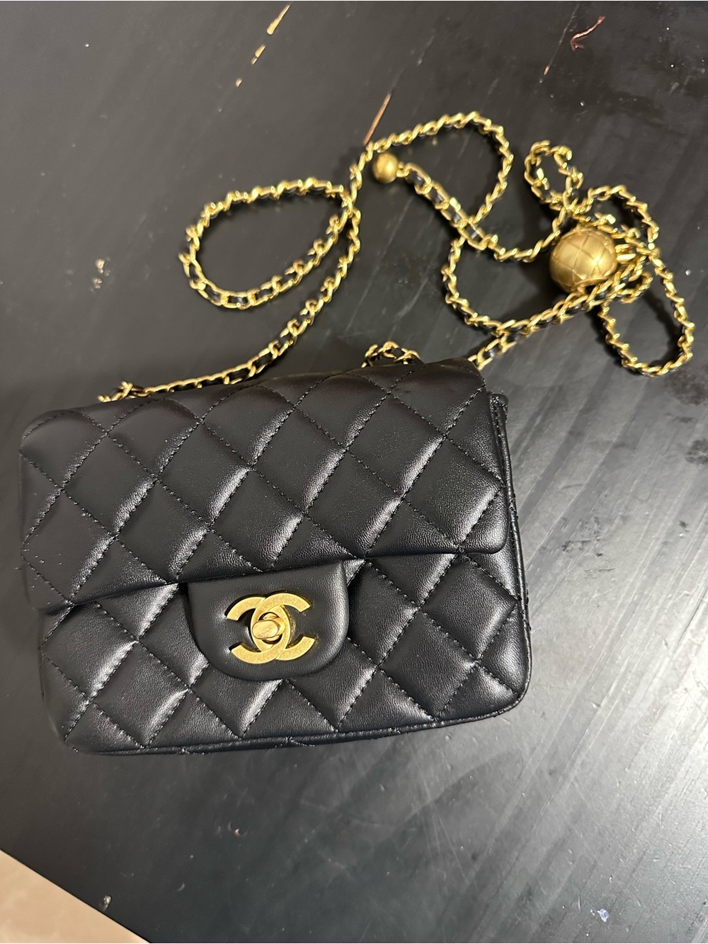 CHANEL Black Quilted Mini Crossbody with Gold Chain